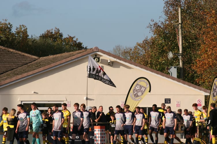 The flag flying high at Buckland for their Remembrance Day fixture
