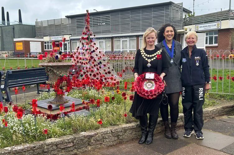Teignmouth mayor councillor Cate Williams with Teignmouth deputy mayor councillor Lillian Chasteau and RNLI volunteer crew Anne Steele Arnett at the RNLI Remembrance Garden on Teignmouth Den