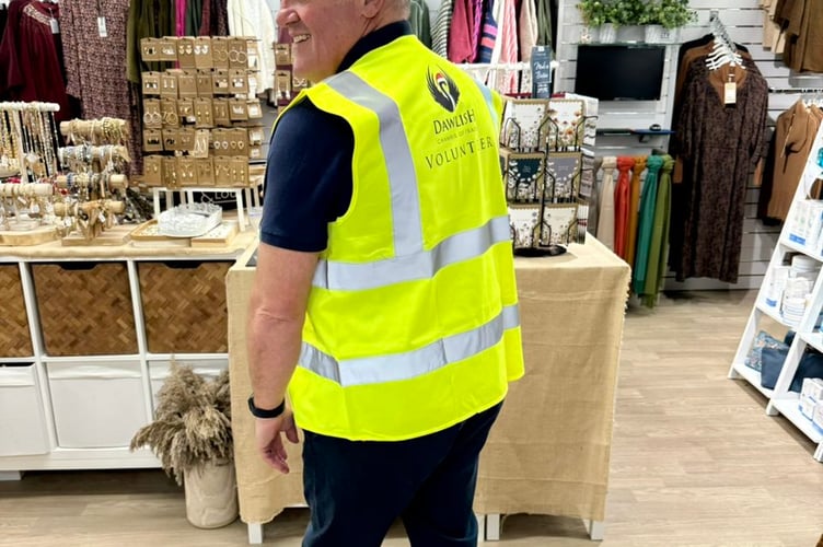 Sean Nicks, owner of the Shoe Centre in The Strand, sporting one of the new chamber hi-vis vests. Photo Dawlish Chamber of Trade