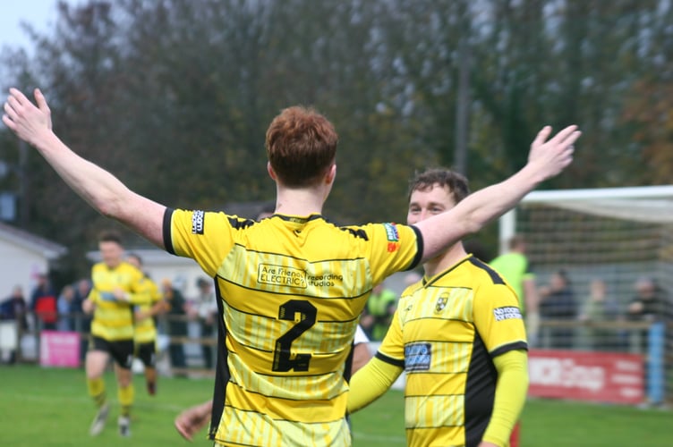 Buckland fullback Rafael Beadman has his arms aloft 