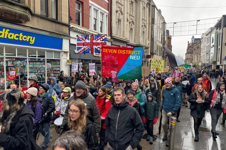 Members of the Exeter is for Everyone group during their march. AQ 8672