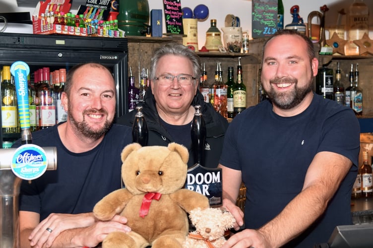 HITS chair David Cox (centre) is grateful that Jamie Ayre and Byron Beacham from The Brass in Teignmouth have taken on the HITS Christmas toys appeal.