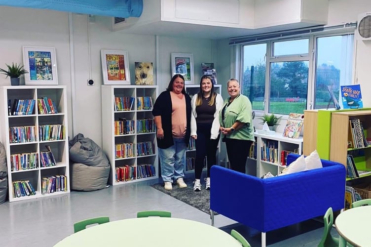 Staff in the furnished new hall at Kenton School. Photo Kenton School 