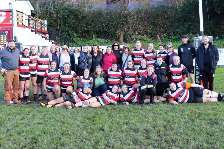 Past and current players celebrating a successful result on  TRFC Womens'10th anniversary
