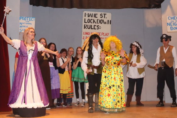 Cast members from Up Hills and Down Dale kept in check by Fairy Mary