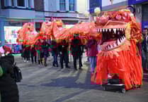 WATCH: Parade shines a light on community spirit