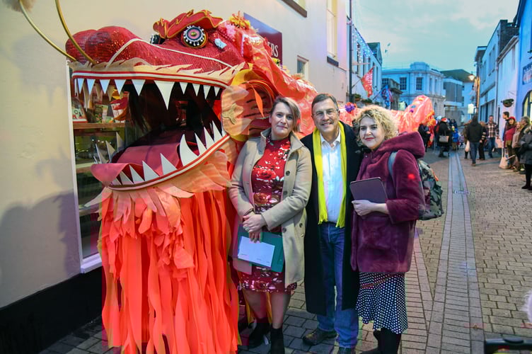 Alice the Dragon, Sam Lock from The Makery, Martin Wrigley MP, and Peta Howell, general manager of the Alice Cross Community Centre at the Teignmouth Lantern Parade.