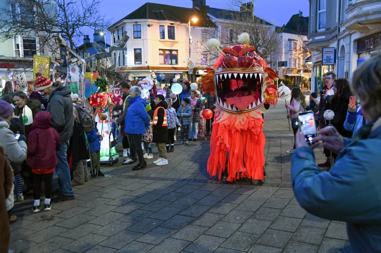 Alice the Dragon led the community lantern parade in Teignmouth