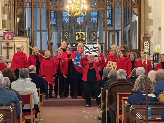 Red Rock A Capella performing at the Teignmouth RNLI carol service