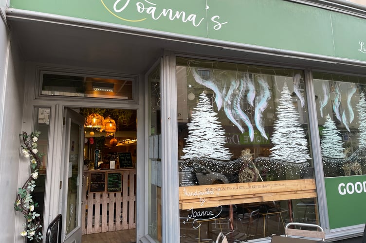 The handpainted Christmas trees at Joanna's impressed the judge of the Teignmouth festive window competition