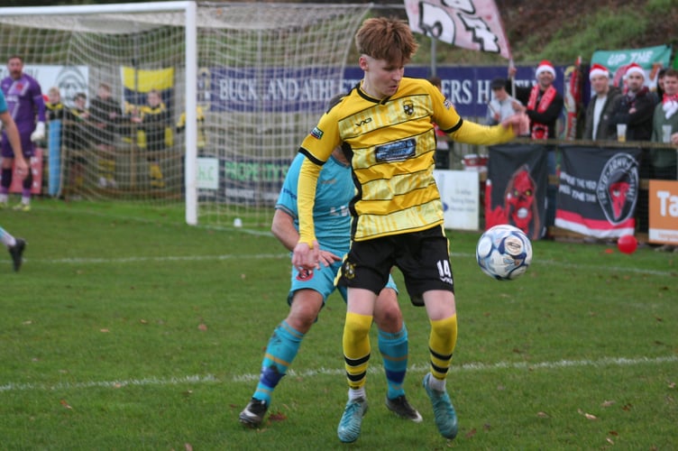 Isaac McCue on the ball for Buckland