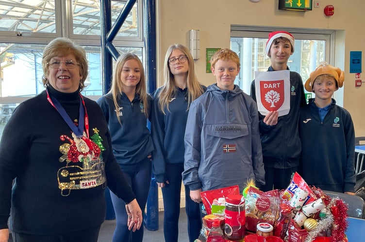 Dawlish deputy mayor councillor Lynda Littlewood selected the hamper made by students from Dawlish College's Dart House as the winner for its festive red theme.