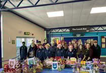 Students spread Christmas joy with food hampers