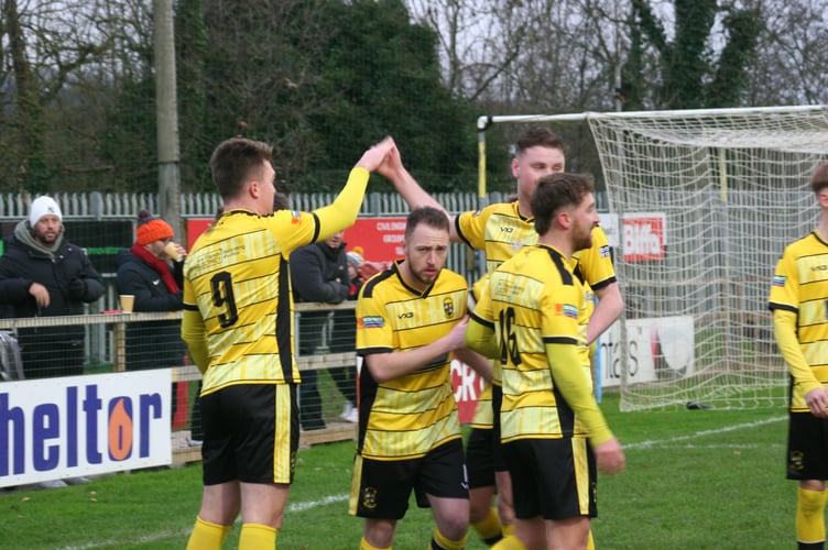 Ryan Bush celebrates his opener on Boxing Day. 