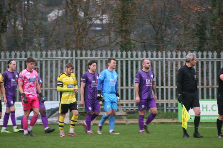 Buckland and Ivybridge players walking out