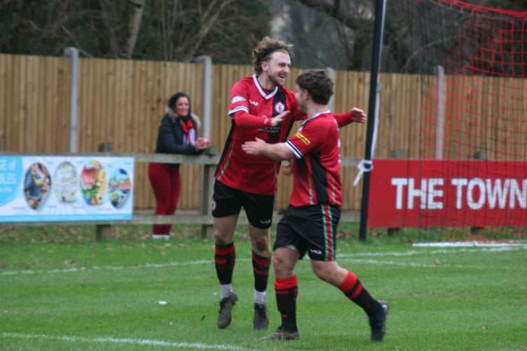 Cal Leech celebrates his opener against Stoke