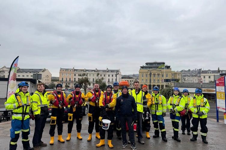Volunteers from Dawlish Coastguard and Teignmouth RNLI on Teignmouth Seafront on Boxing Day