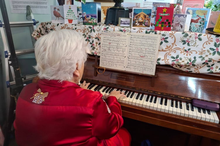 Viv Wilson MBE played the piano and sang as part of the entertainment at the Alice Cross Centre Christmas Day lunch.