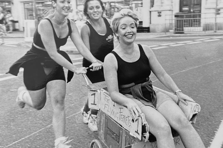 The Flying Ferrets head out at the start of Dawlish Carnival's Pram Race in August 1995