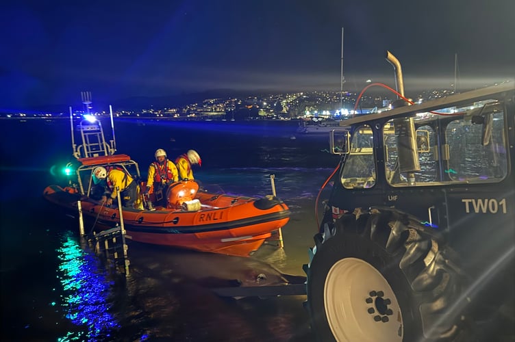 The Claude and Kath launched for the first time in 2026 on Monday night (January 5) as Teignmouth RNLI volunteers rescued three people trapped by the rising tide.