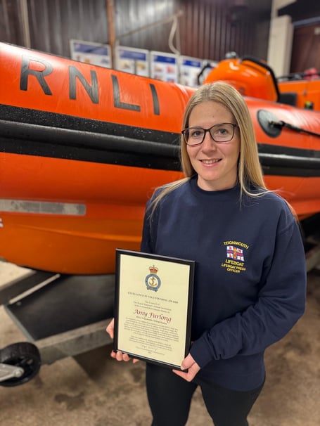 Teignmouth Lifeboat Station press officer Amy Furlong has been awarded a prestigious RNLI volunteering award.
