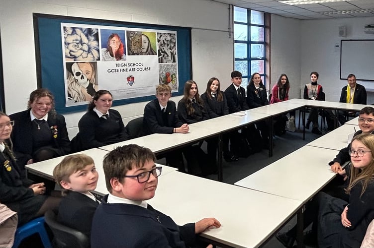 Students from Teign School quiz MP Martin Wrigley.