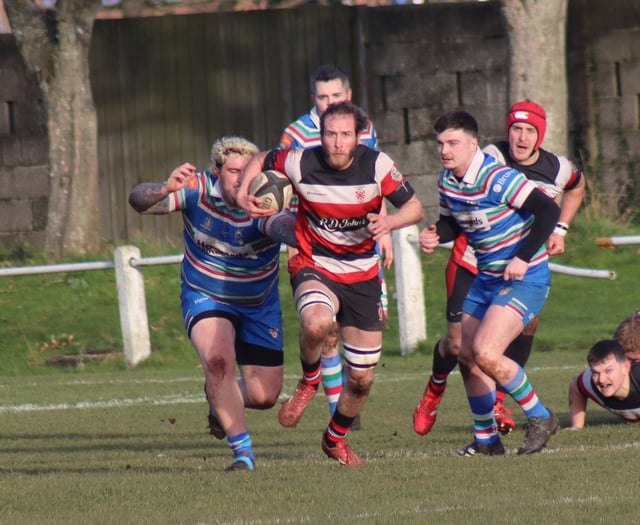 Teigns toppled by runaway league leaders