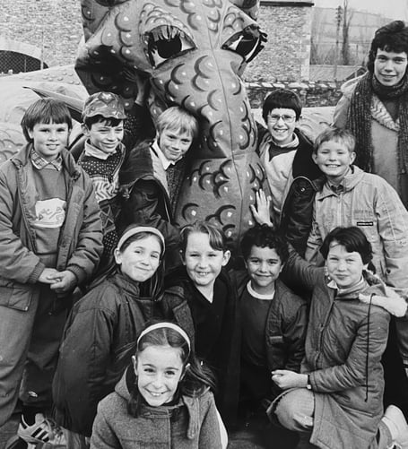 Youngsters from St Mary's Primary School in Buckfasteigh after their sponsored bounce on a giant inflatable dragon in February 1985
