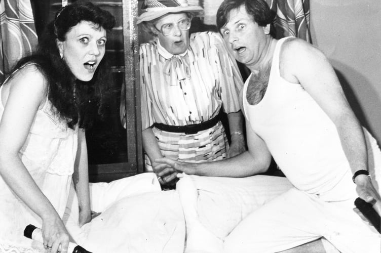 Sharon Andrews, Yvonne George and Dennis Smith in a scene from Ipplepen Amateur Dramatic Society's show for May 1986 called Lucky For Some