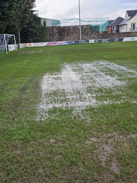 Newton Spurs' wet pitch