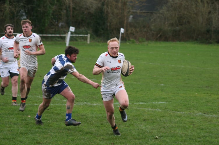 NARFC winger Josh Southworth evades his opposite man