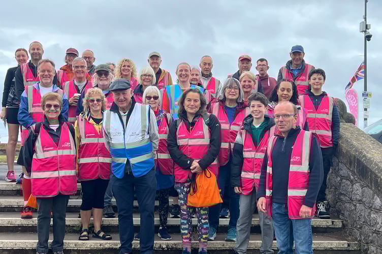 Teignmouth Promenade parkrun event director and founder Paul Burgess (bottom right) cites the dedication of more than 800 volunteers to the event's success.