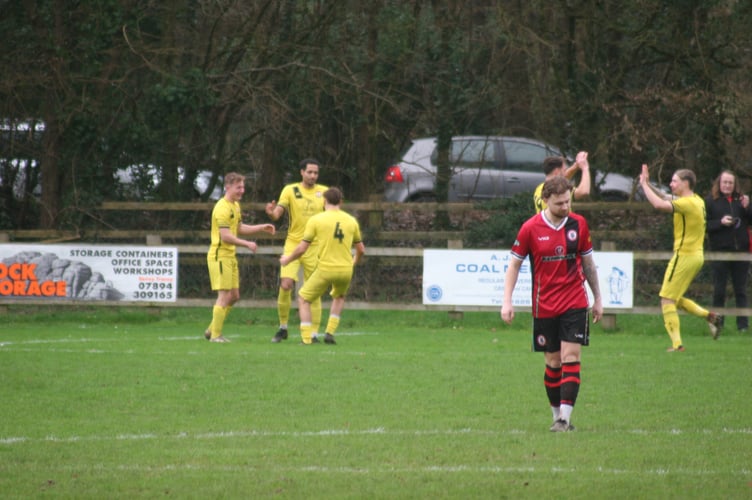 Bridport celebrate taking an early lead at Bovey Tracey