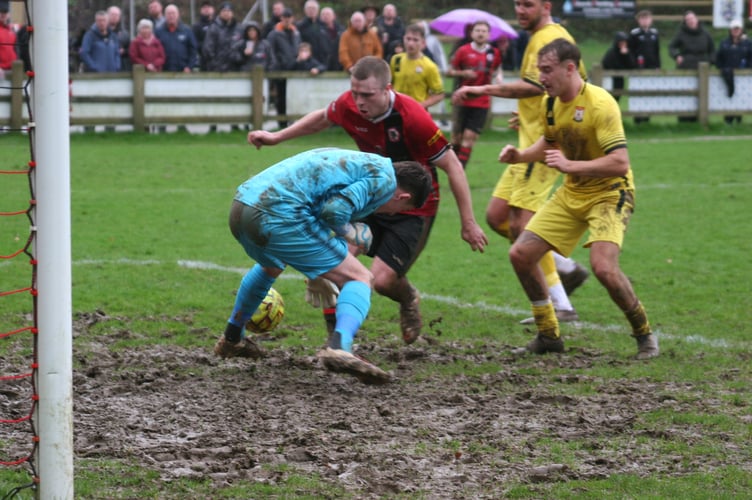 Ollie Aplin profits from Bridport's defensive mishap