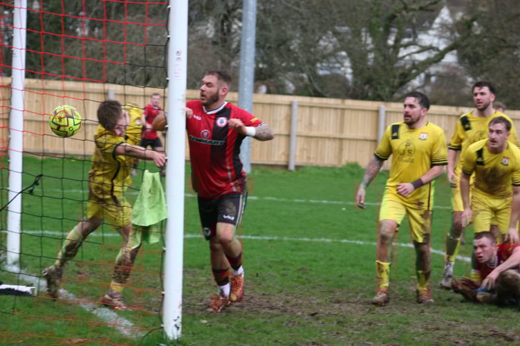 Stuart Bowker scores his first of three goals against Bridport