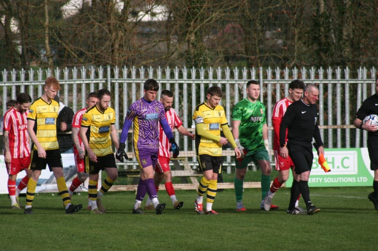 Here comes the Buckland and Bridgwater players