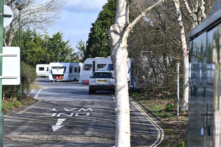 Travellers set up camp in the car park of Teignbridge Council's Newton Abbot headquarters