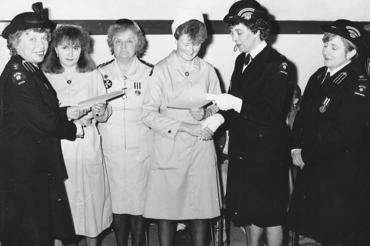 Presentation of Grand Prior Badges at St John's Ambulance Station in Dawlish from April 1986. From left: Area Commisioner Mrs Pierce, Joanna Gibbons, Mrs F Miller, Miss Clare Lorem, Mrs R Larkin and Mrs A Reed