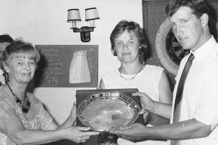 June 1989 and Jean Hicks, chairman of Bishopsteignton United Football Club, presents Ivor and Jean Lang with a silver salver to say thank you for keeping the Humber football pitch in good order for many years