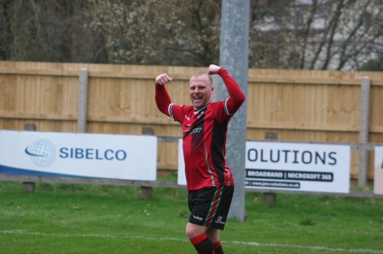 Lewis Perring celebrates scoring the Bovey opener