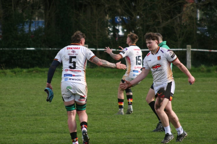 Reuben Brinkley celebrates his try in the shield final