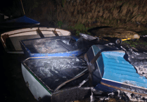 Boats 'severely damaged' by fire at Boat Cove beach