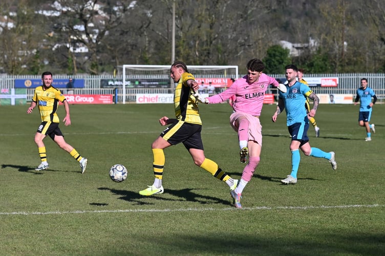 Jewson Western Football League Premier Division. Match action from Buckland Athletic versus Brislington with a full-time score of 2-2. 