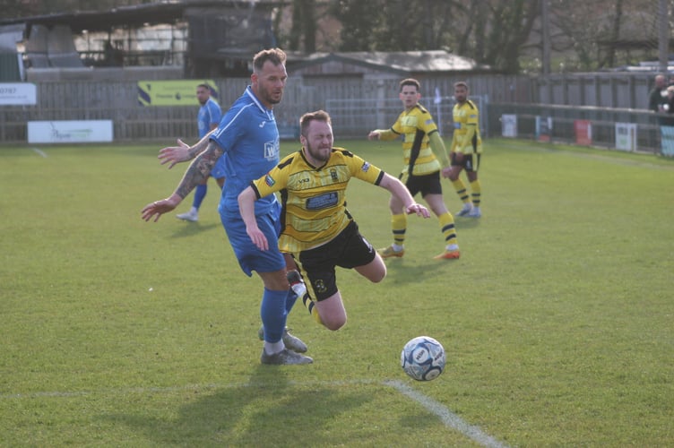 Luke Forward goes down on the edge of the area