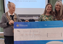 Newton Abbot friendship group's £1,000 cheque for hospice charity