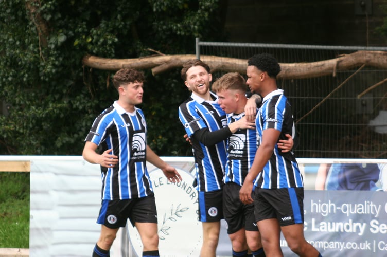 Spurs celebrate Kai Swann's early opener against Teignmouth