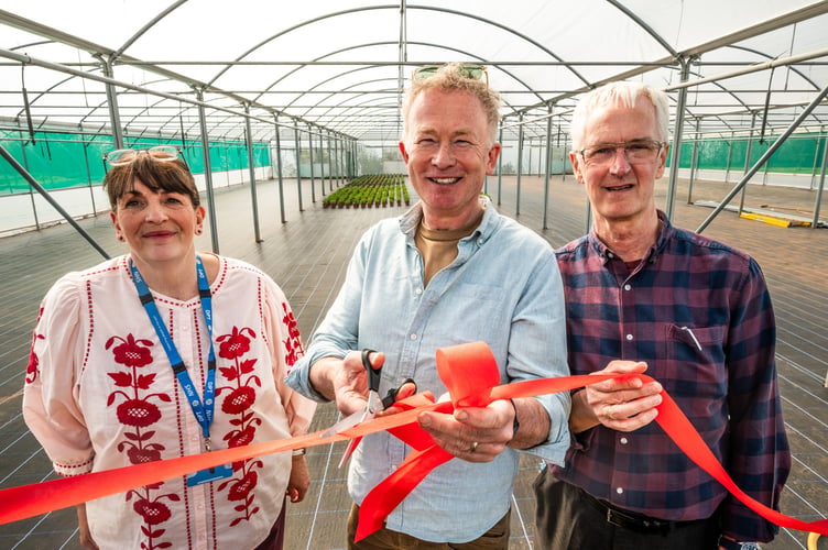Left to right: Della Norris, Vocational Services Manager, Toby Buckland, celebrity gardener and Trevor Moir, Clinical Service Manager at the new polytunnels at New Leaf in Exminster. Photo: GRW Photography