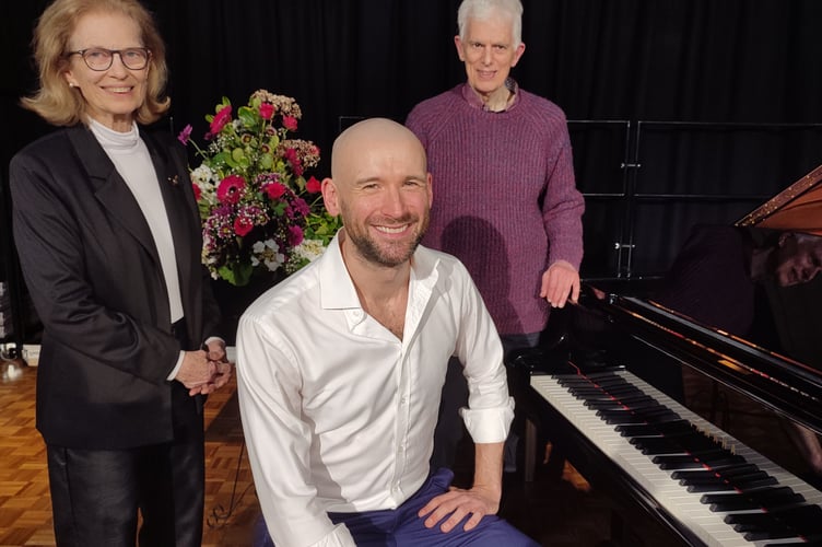 John Paul Ekins after his performance for NADSA concerts with  Mary White and David Austin representing the sponsor Austins Department Store