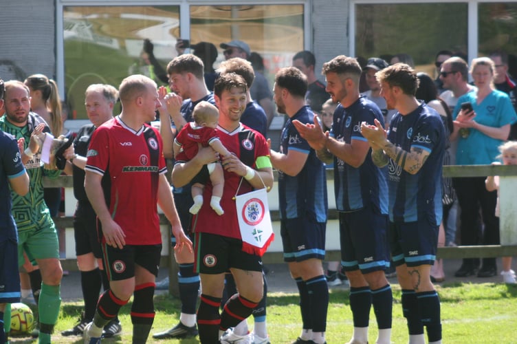 Cliff Walters leads Bovey out for the final time