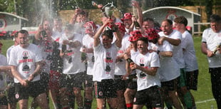 Bovey Tracey AFC hoist league title aloft